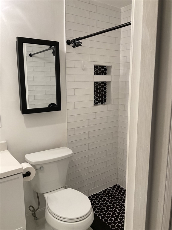 26 Summer Street, Unit 8 Marblehead, MA 01945 - Photo 17 of 23 a bathroom with a toilet and a shower