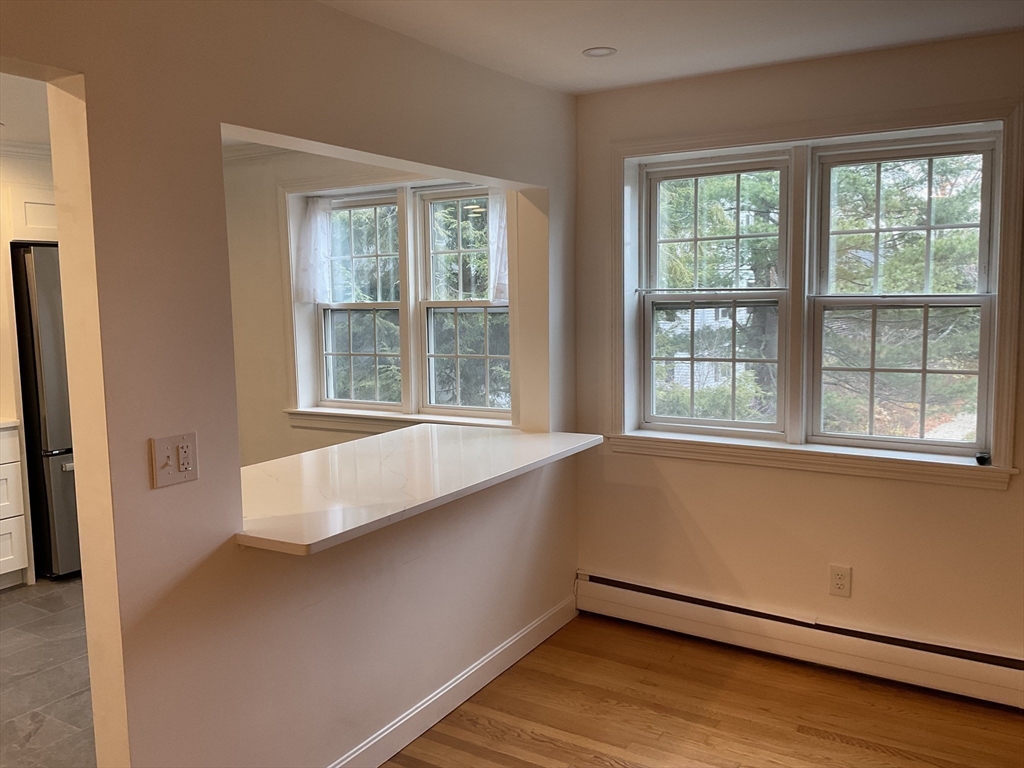 26 Summer Street, Unit 8 Marblehead, MA 01945 - Photo 9 of 23 a view of an empty room with a window