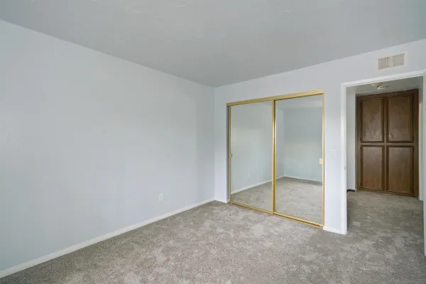 a bathroom with a sink a mirror and a toilet