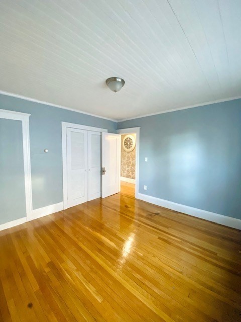 117 Beach Street Quincy, MA 02170 - Photo 13 of 20 a view of empty room with wooden floor
