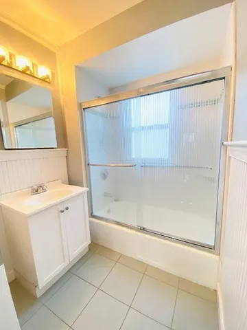 a bathroom with a sink a toilet and a bathtub