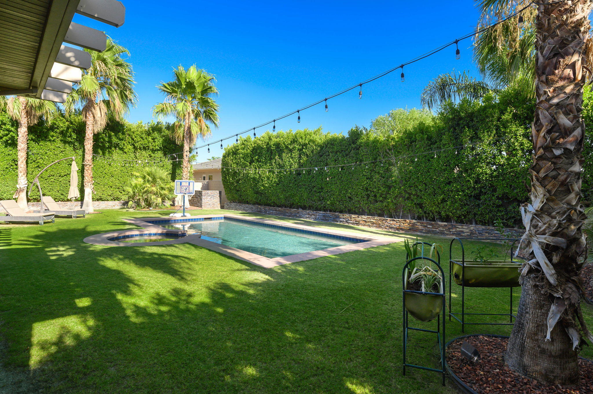 43 Provence Way Rancho Mirage, CA 92270 - Photo 14 of 31 a view of a swimming pool with a patio