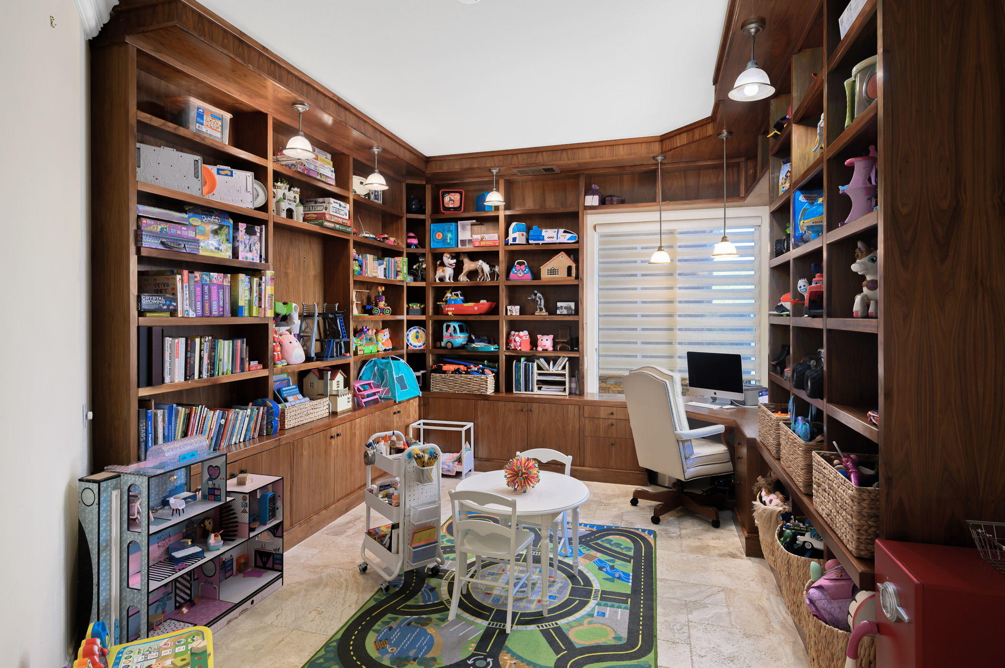 43 Provence Way Rancho Mirage, CA 92270 - Photo 20 of 31 a room with furniture and a book shelf