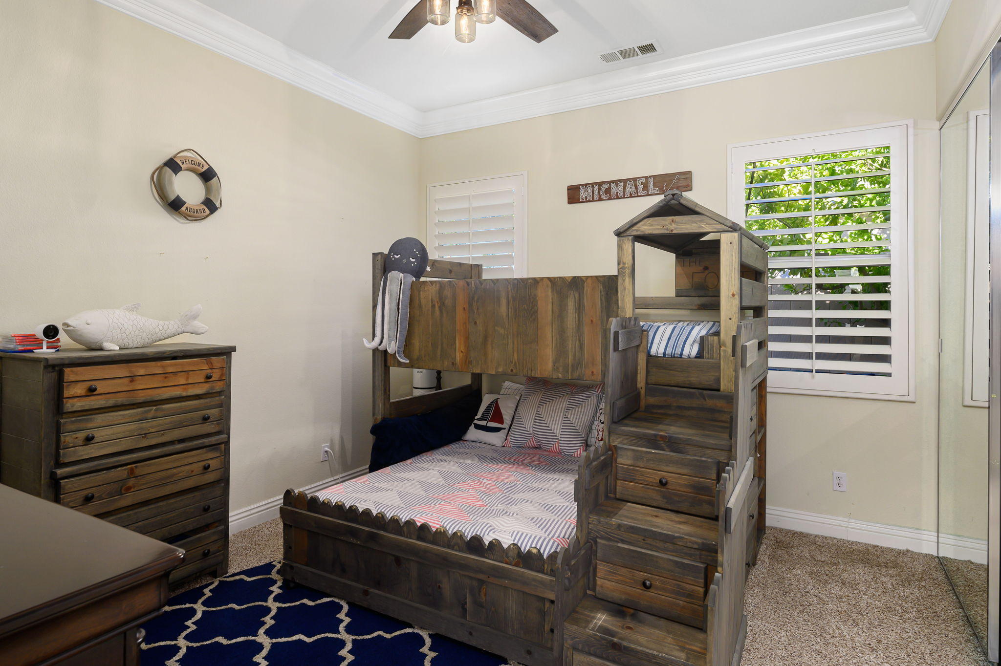 43 Provence Way Rancho Mirage, CA 92270 - Photo 21 of 31 a bedroom with a bed and a dresser