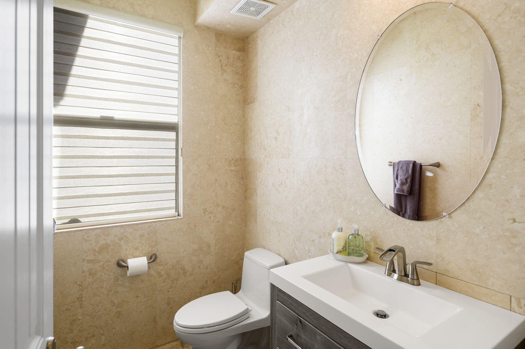 43 Provence Way Rancho Mirage, CA 92270 - Photo 22 of 31 a bathroom with a sink mirror and toilet