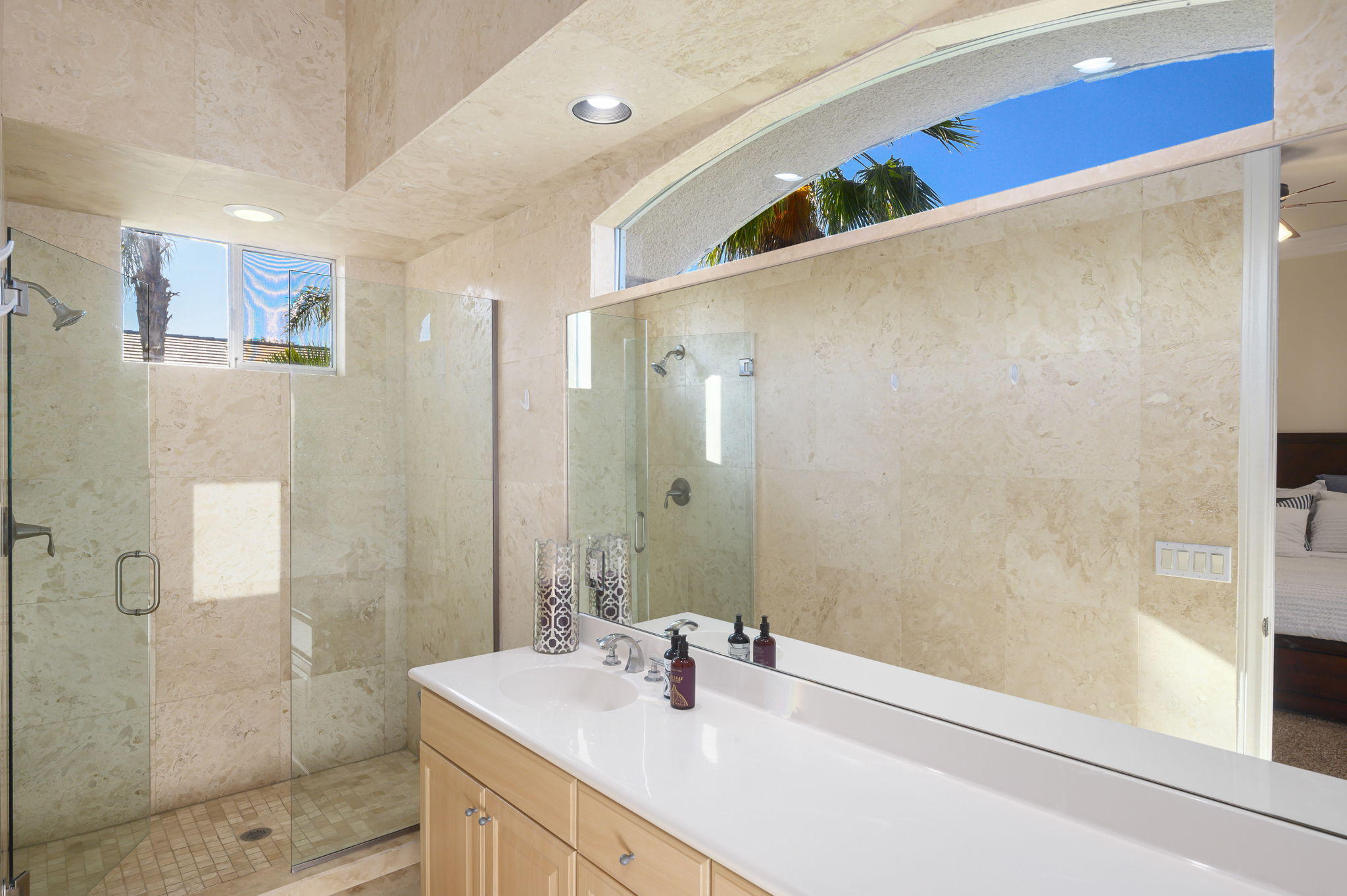43 Provence Way Rancho Mirage, CA 92270 - Photo 25 of 31 a bathroom with a sink and a mirror