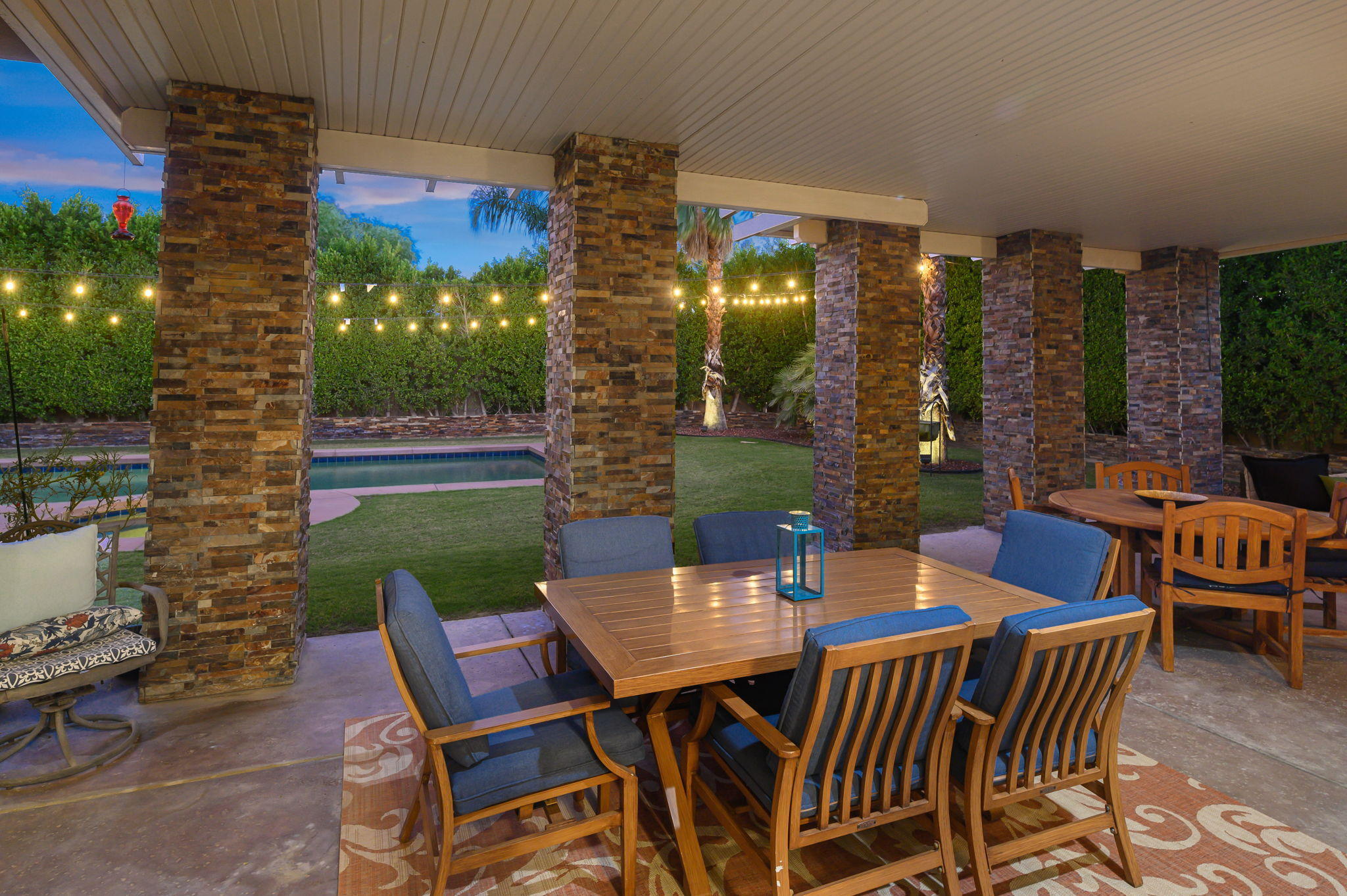 43 Provence Way Rancho Mirage, CA 92270 - Photo 28 of 31 a view of an outside dining space with furniture