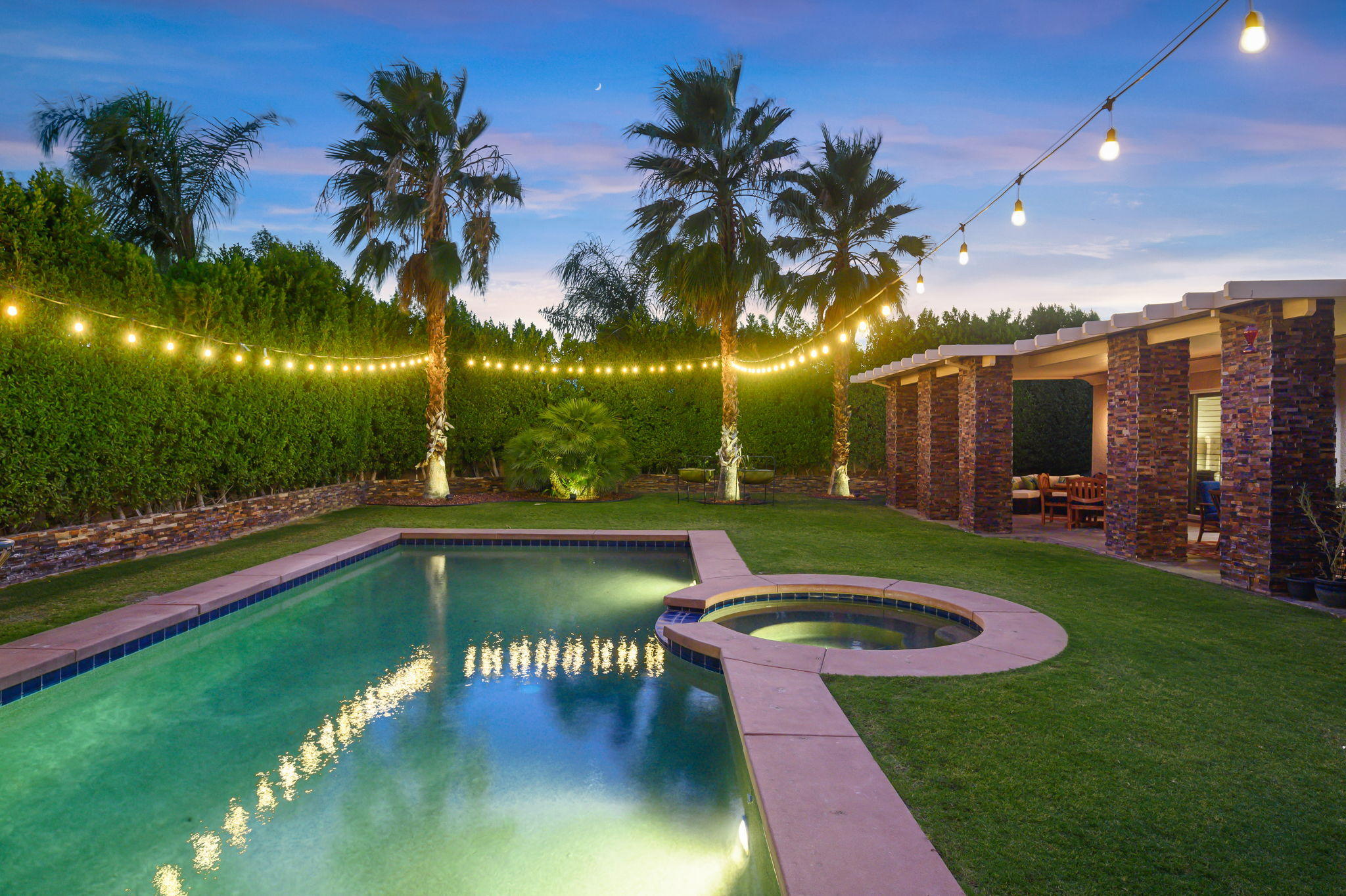 43 Provence Way Rancho Mirage, CA 92270 - Photo 29 of 31 a view of a swimming pool with a patio