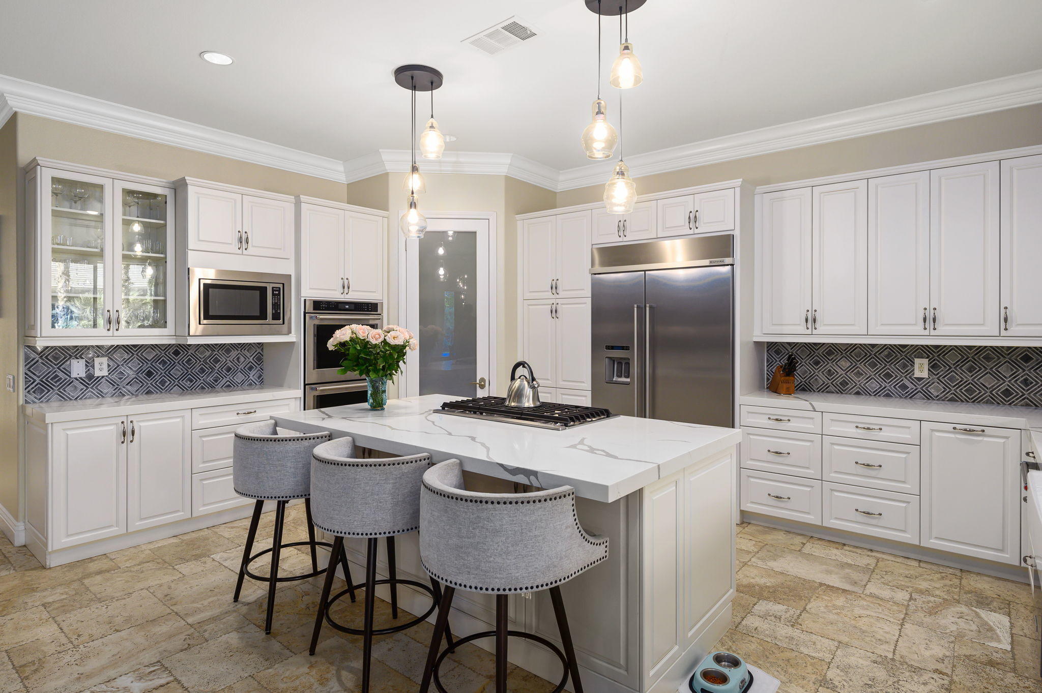 43 Provence Way Rancho Mirage, CA 92270 - Photo 8 of 31 a kitchen with stainless steel appliances kitchen island granite countertop a kitchen island hardwood floor and a sink