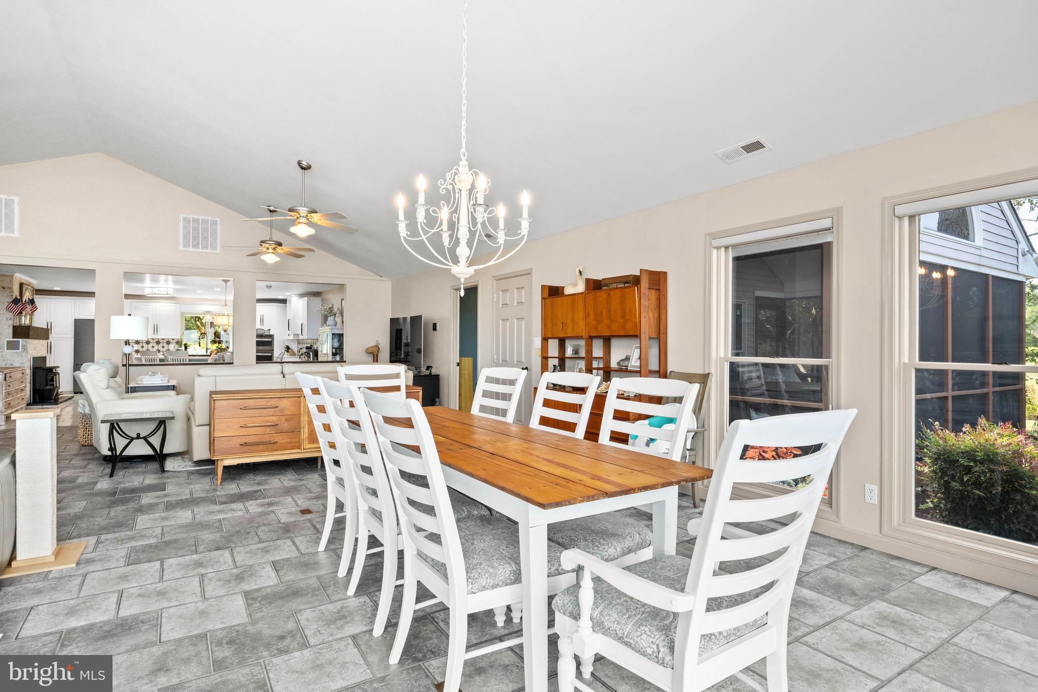 3998 Oyster Shell Lane Tyaskin, MD 21865 - Photo 31 of 100 Dining Area with side Door to Sunroom and Koi Pond