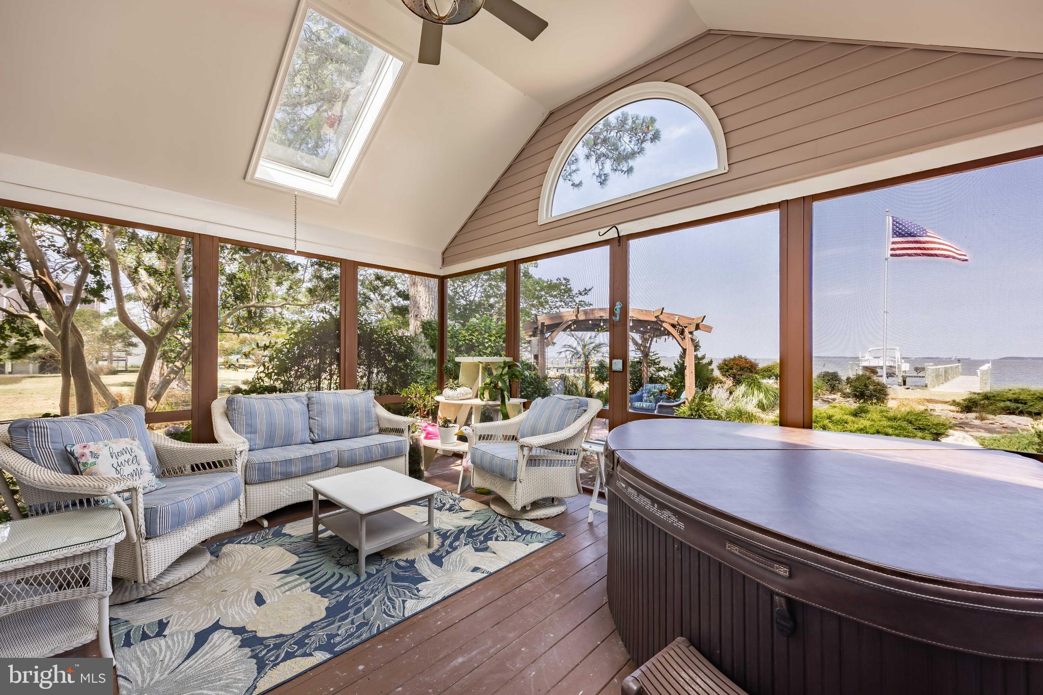 3998 Oyster Shell Lane Tyaskin, MD 21865 - Photo 46 of 100 Sun Room with Views of Koi Pond