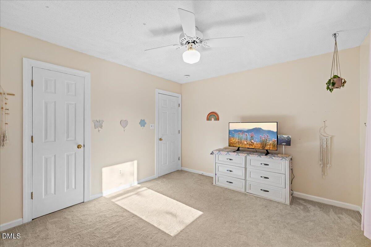 850 Lewis Winstead Loop Roxboro, NC 27574 - Photo 21 of 49 a view of a bedroom with cabinet cabinet and cabinet