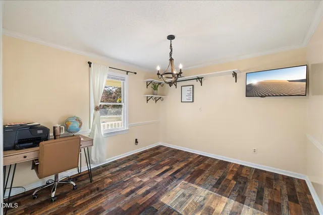 a view of kitchen and wooden floor