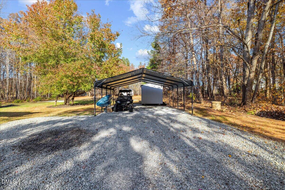 850 Lewis Winstead Loop Roxboro, NC 27574 - Photo 40 of 49 a view of house with outdoor space and parking