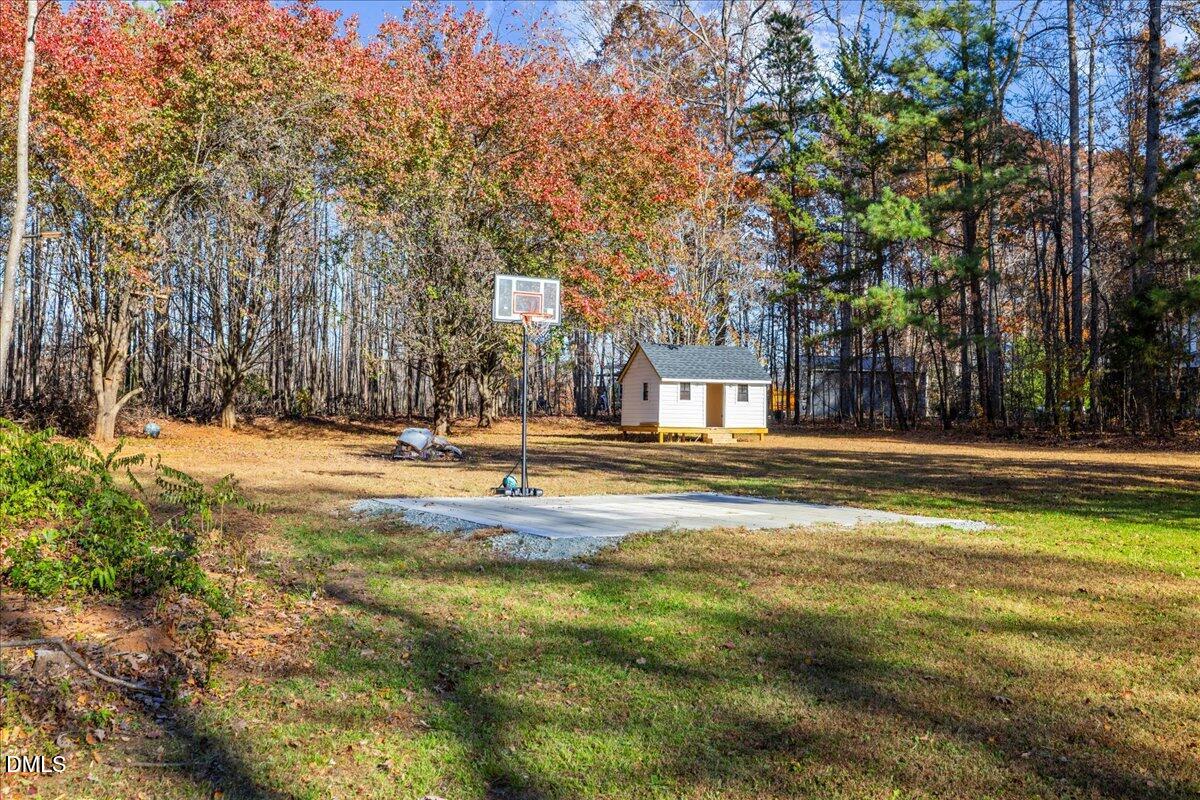 850 Lewis Winstead Loop Roxboro, NC 27574 - Photo 45 of 49 a view of swimming pool with large trees