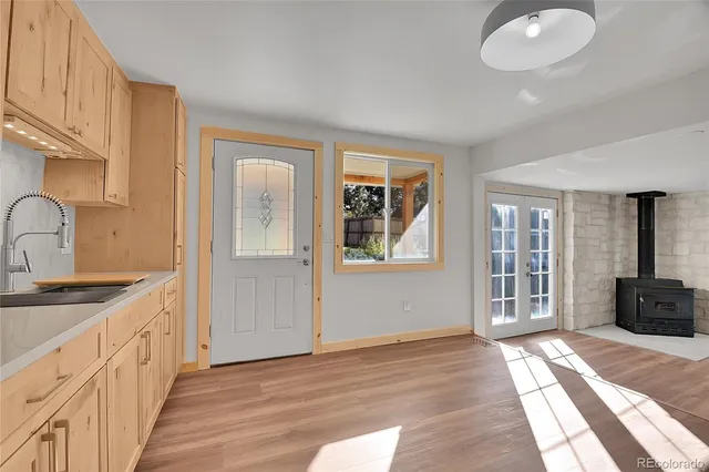 a view of a kitchen from the hallway
