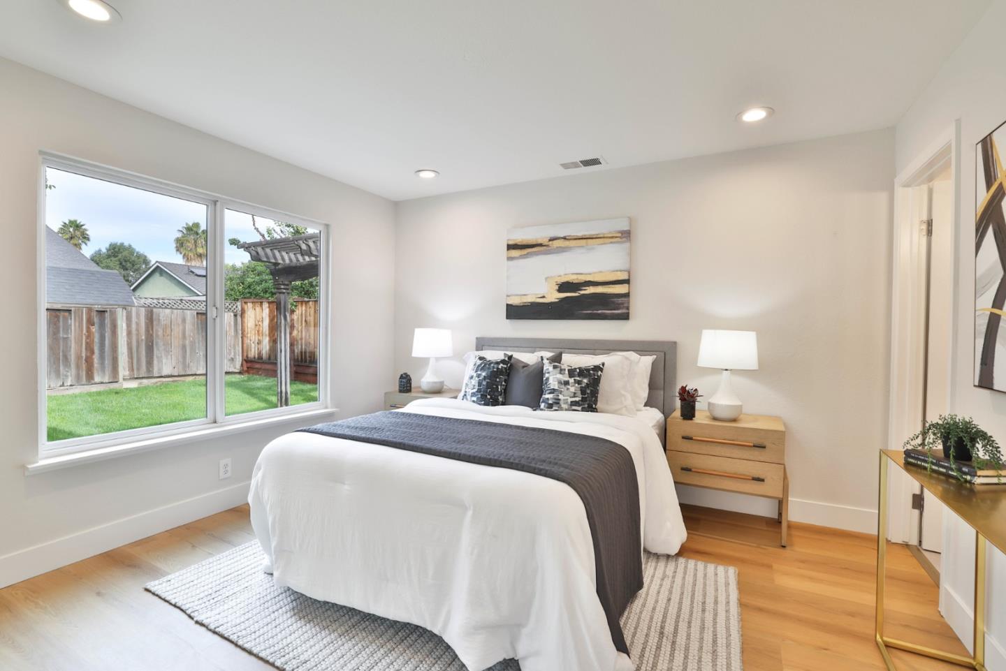 2053 Jonesport Avenue San Jose, CA 95131 - Photo 15 of 28 a bedroom with a bed and a large window