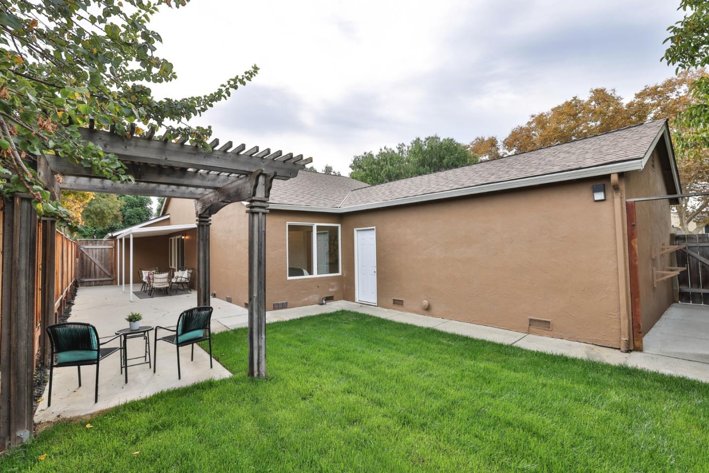 2053 Jonesport Avenue San Jose, CA 95131 - Photo 21 of 28 a backyard of a house with table and chairs