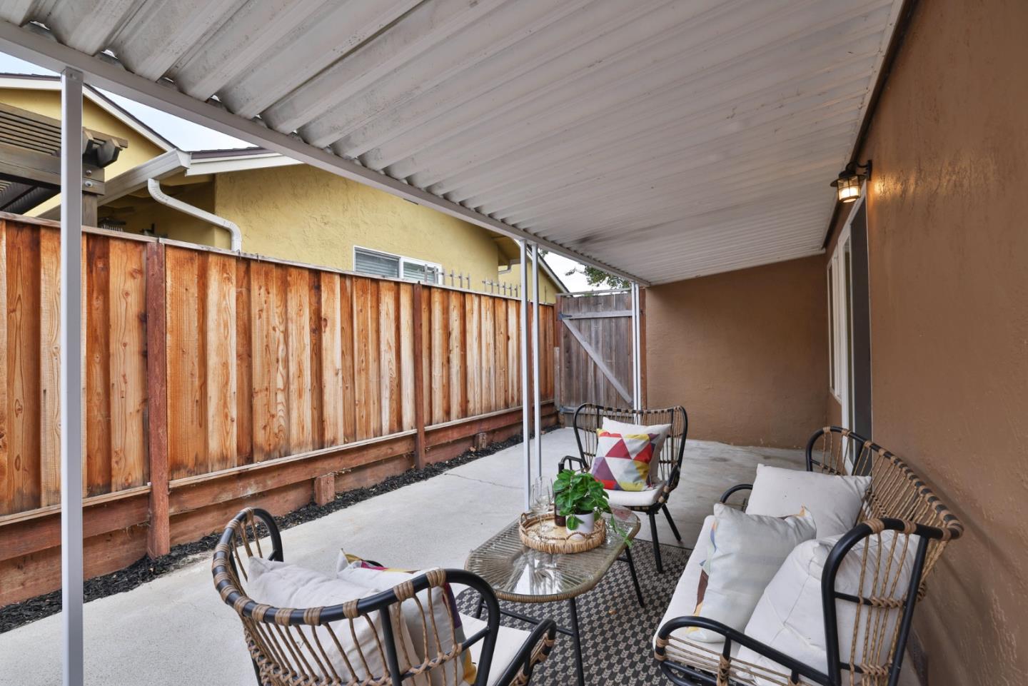 2053 Jonesport Avenue San Jose, CA 95131 - Photo 24 of 28 a backyard of a house with table and chairs