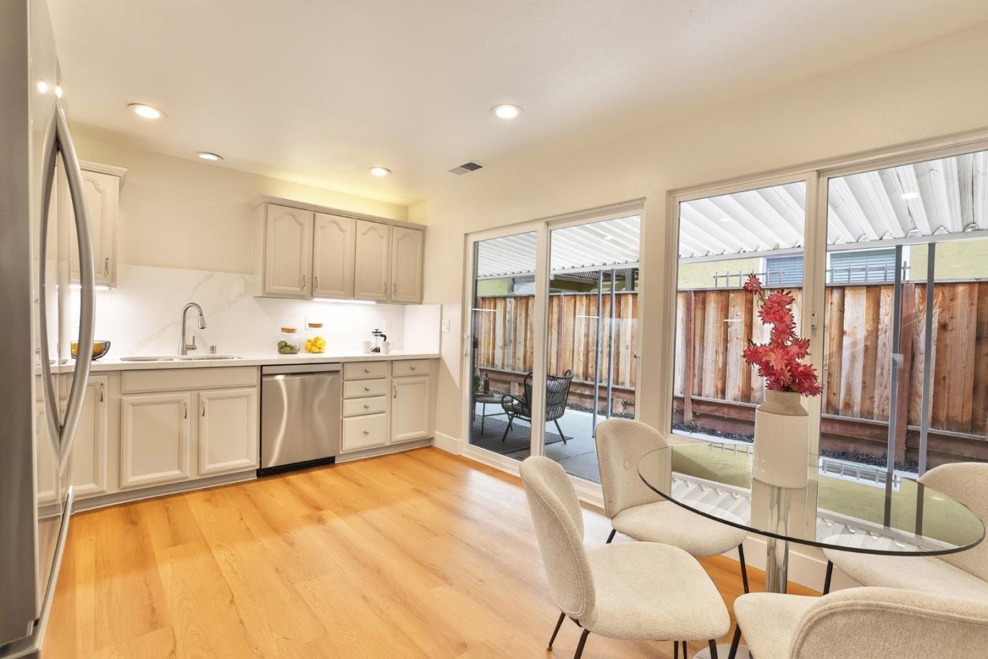 2053 Jonesport Avenue San Jose, CA 95131 - Photo 6 of 28 a large white kitchen with a large window