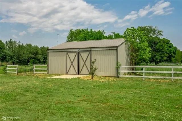 179 Ranchtown Road Elm Grove, LA 71051 - Photo 16 of 26 Barn structure with metal siding and a pitched metal roof