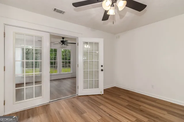 a view of a yard with tree s