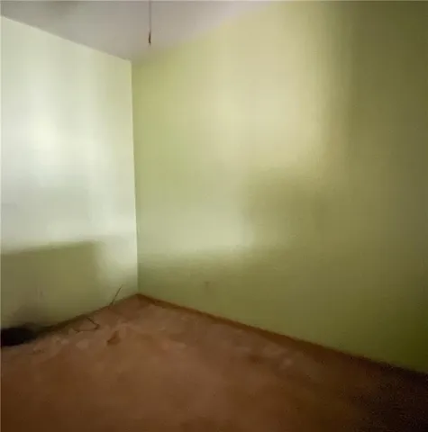 a view of hallway with livingroom