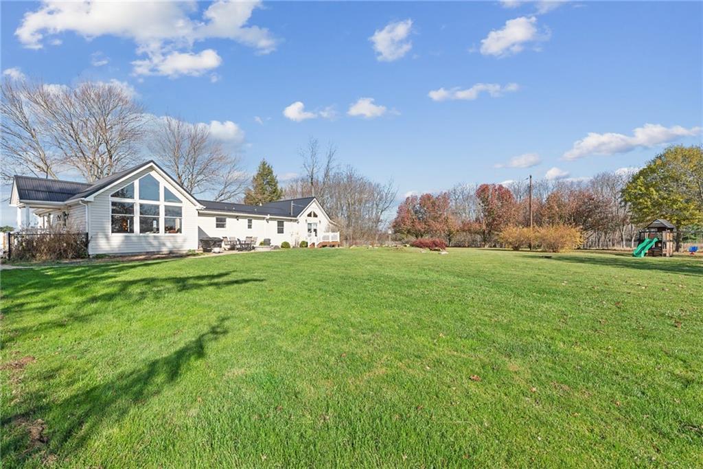 125 Nursery Road Renfrew, PA 16053 - Photo 1 of 37 a front view of a house with garden