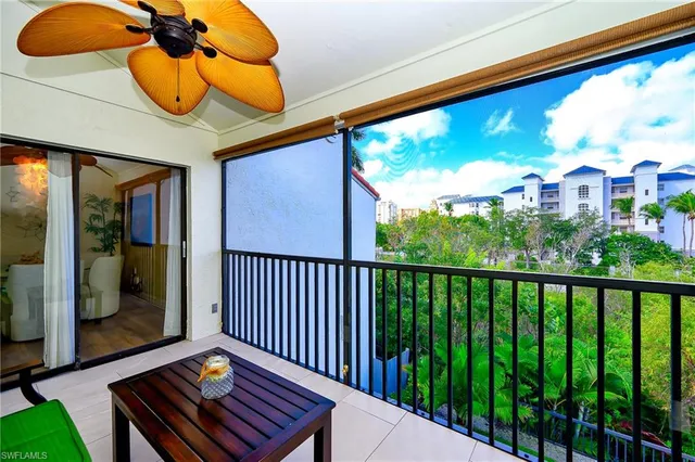 a view of road with plants and trees around