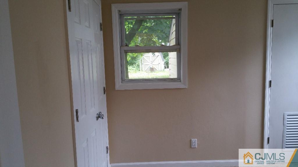 125 Winthrop Road Edison, NJ 08817 - Photo 14 of 23 a view of an empty room with a window