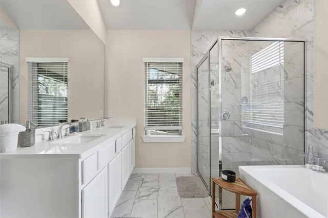 a view of a house with backyard porch and sitting area