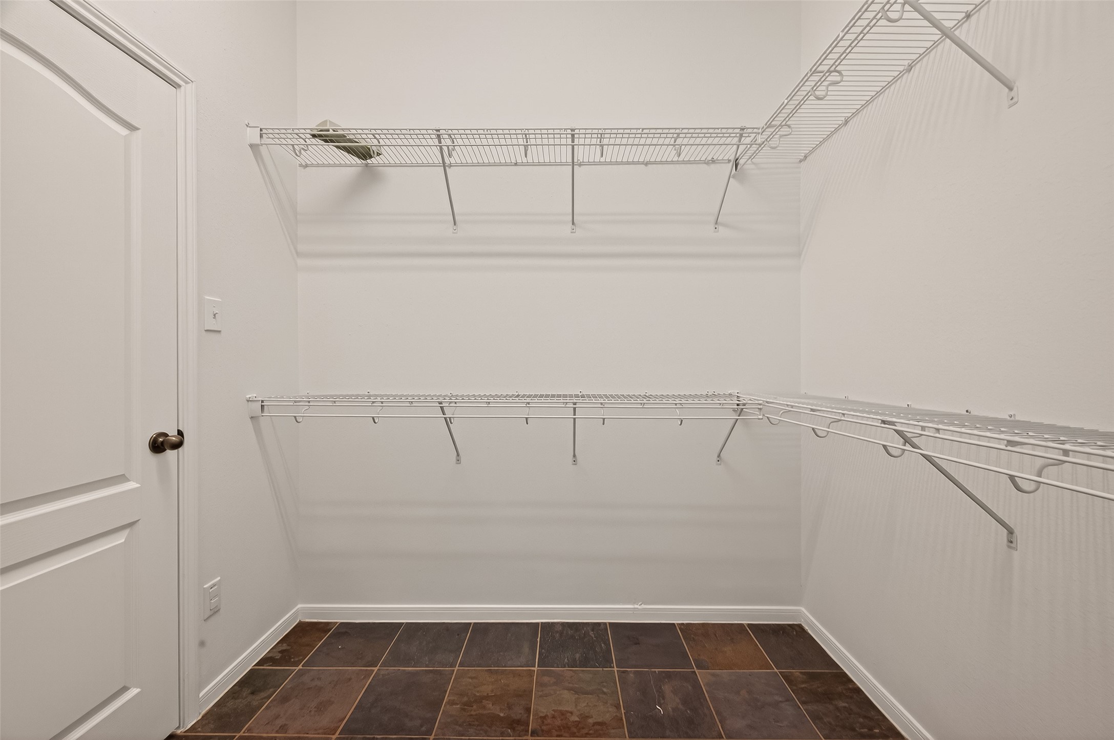 2704 Hewn Rock Way Pearland, TX 77584 - Photo 13 of 40 a view of an empty walk in closet