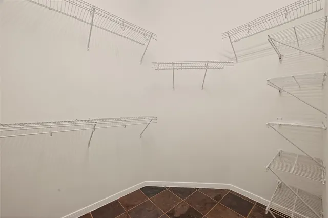 a view of a room with racks on the wall