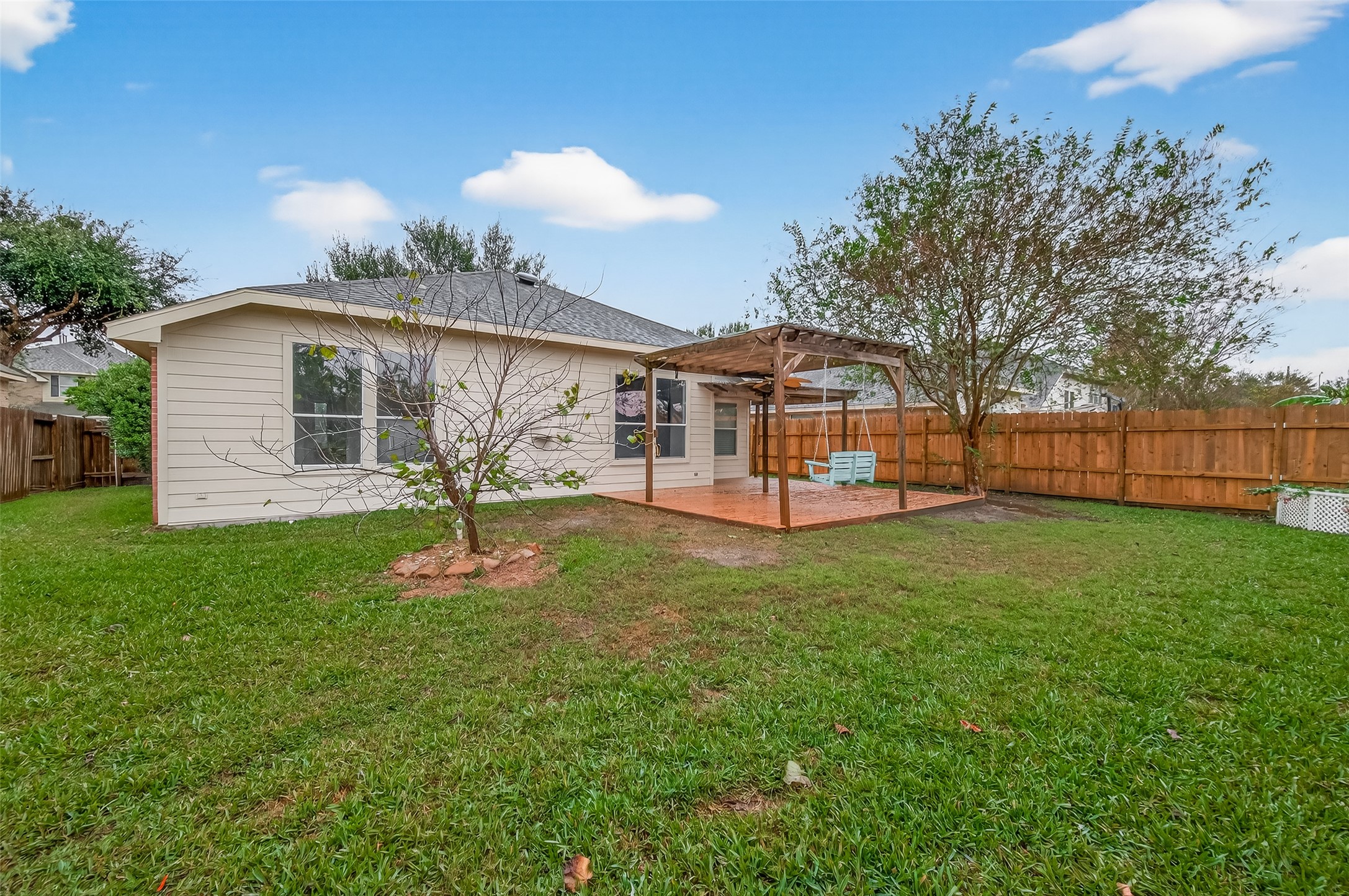 2704 Hewn Rock Way Pearland, TX 77584 - Photo 39 of 40 a view of a house with a backyard
