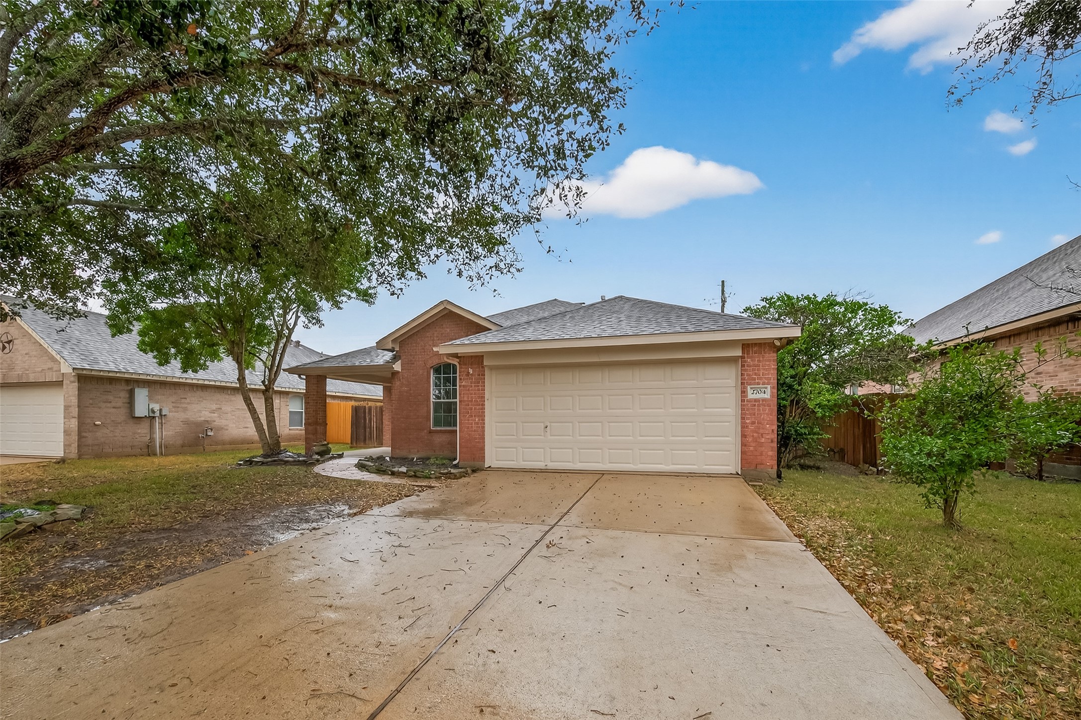 2704 Hewn Rock Way Pearland, TX 77584 - Photo 4 of 40 front view of a house with a street