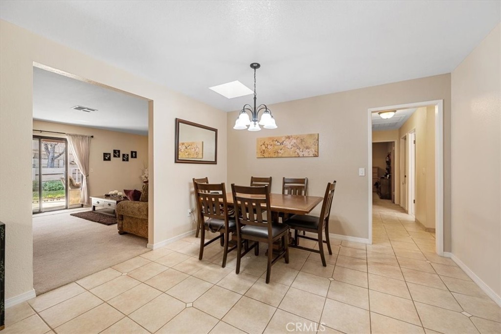 834 Nicklaus Street Paso Robles, CA 93446 - Photo 12 of 37 a view of a dining room with furniture