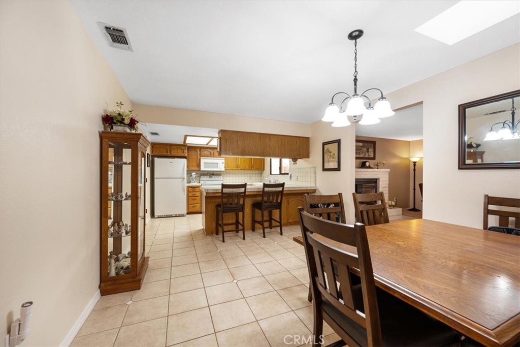 834 Nicklaus Street Paso Robles, CA 93446 - Photo 10 of 37 a view of a dining room with furniture