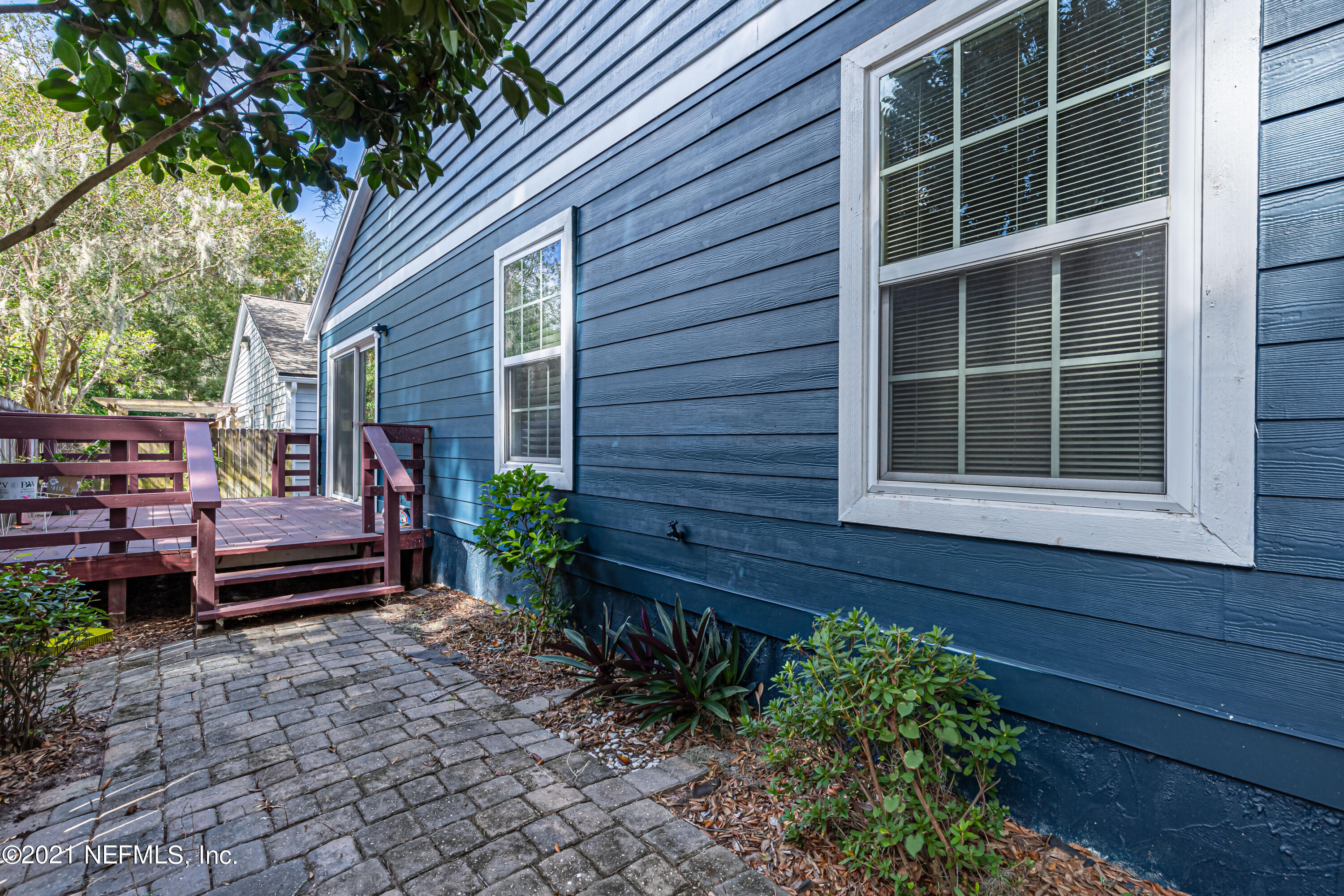 5416 Spring Brook Road Jacksonville, FL 32277 - Photo 27 of 27 a front view of a house with a garden