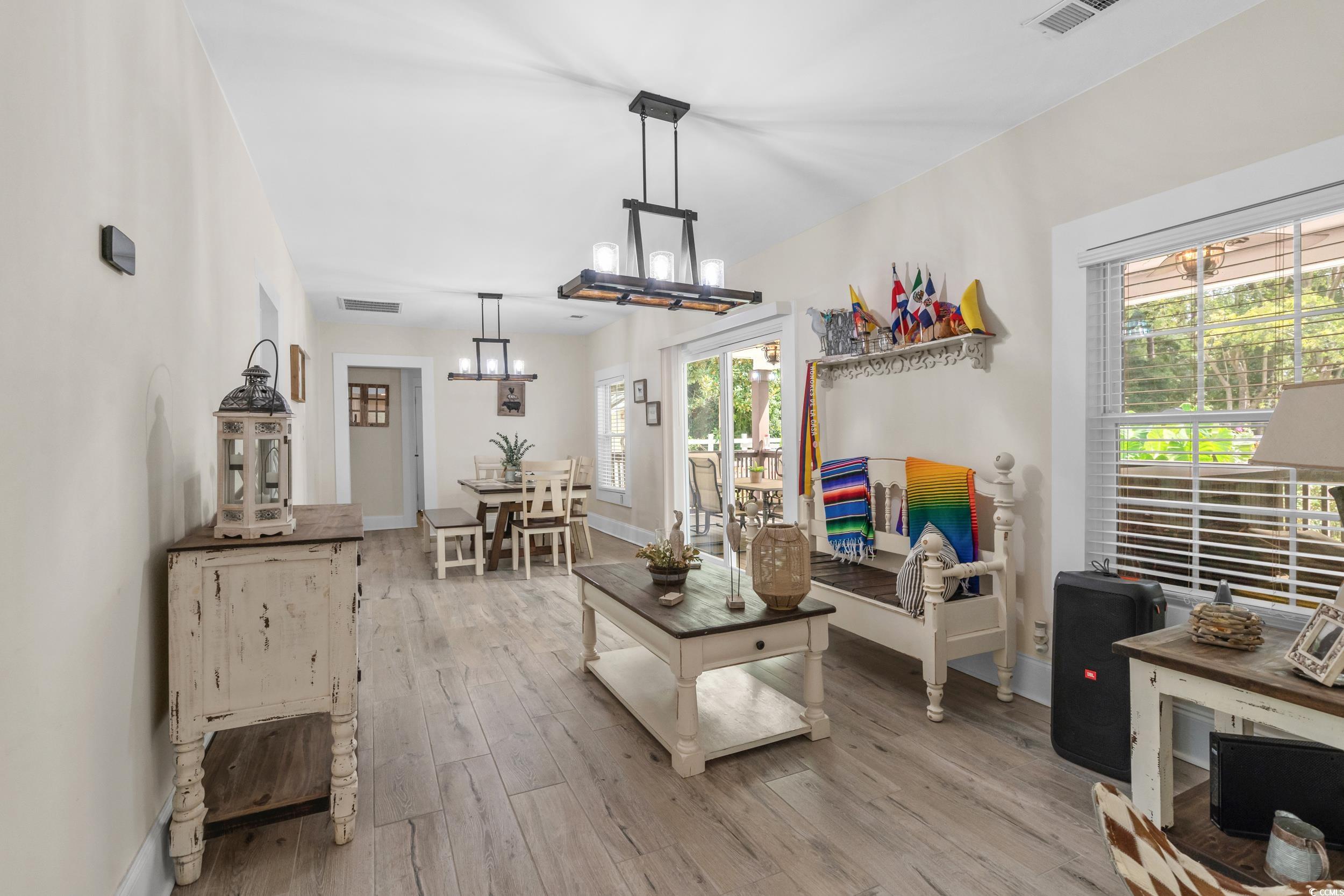 2323 Main Street Loris, SC 29569 - Photo 24 of 40 Living room with light wood finished floors and baseboards