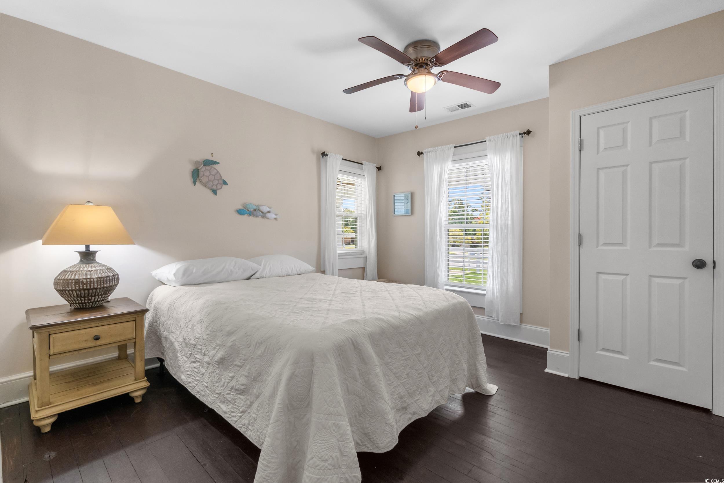 2323 Main Street Loris, SC 29569 - Photo 34 of 40 Bedroom with dark wood-style flooring and ceiling fan