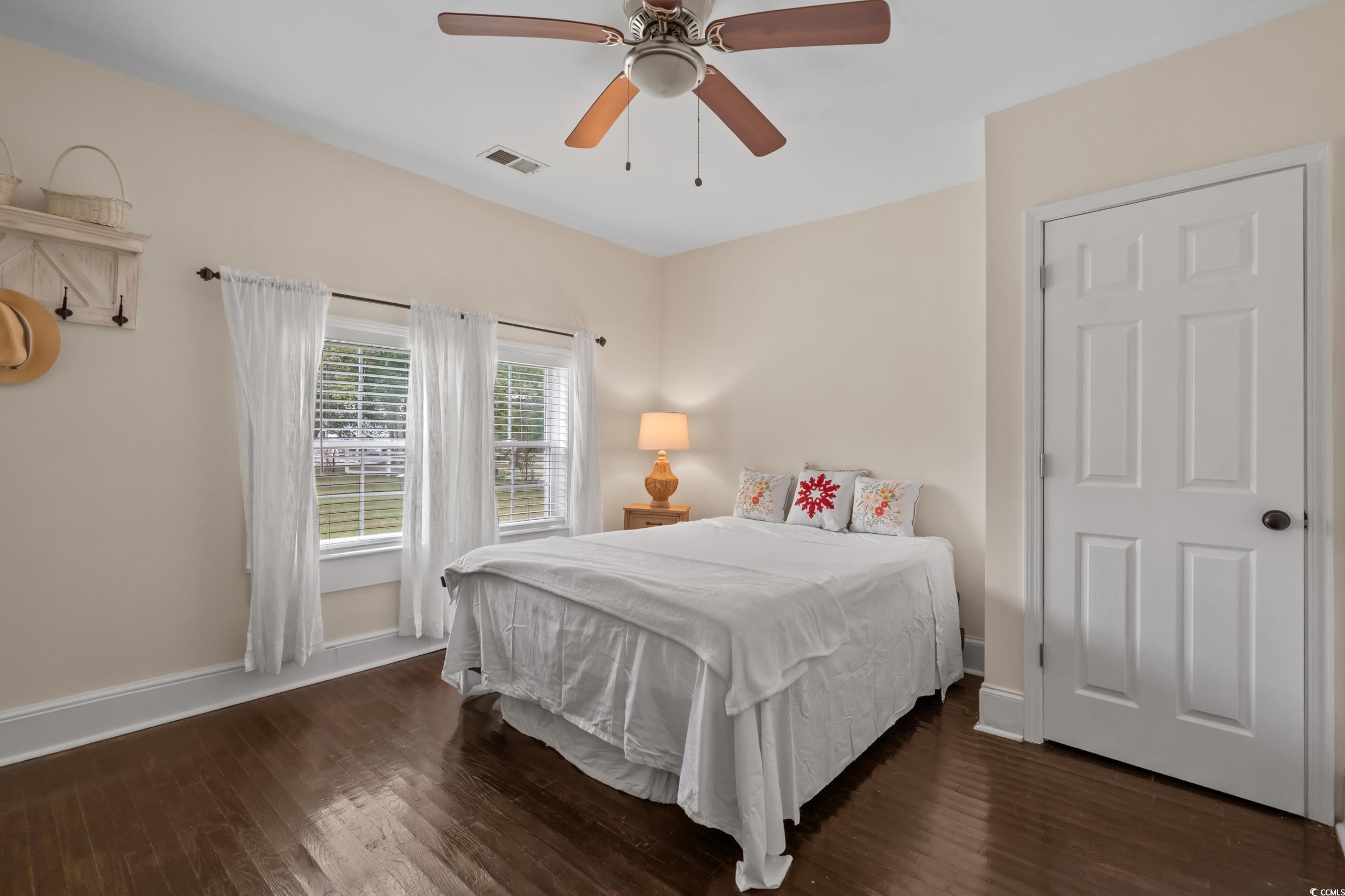 2323 Main Street Loris, SC 29569 - Photo 36 of 40 Bedroom featuring dark wood-style flooring and ceiling fan