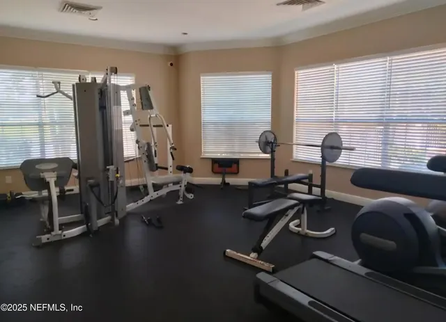 a view of a room with gym equipment