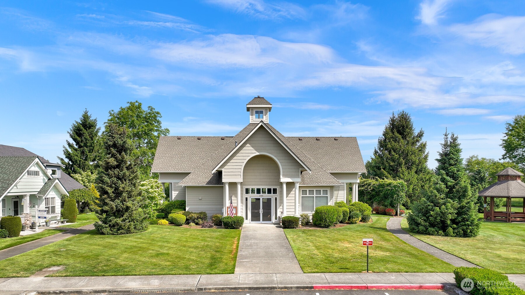 500 Fieldstone Loop, Unit 14 Lynden, WA 98264 - Photo 25 of 25 a view of house with garden and tall tress