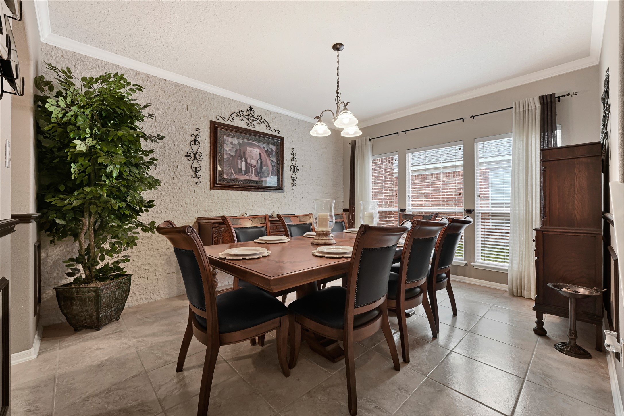 15306 Progress Ridge Way Cypress, TX 77429 - Photo 13 of 37 a view of a dining room with furniture window and wooden floor