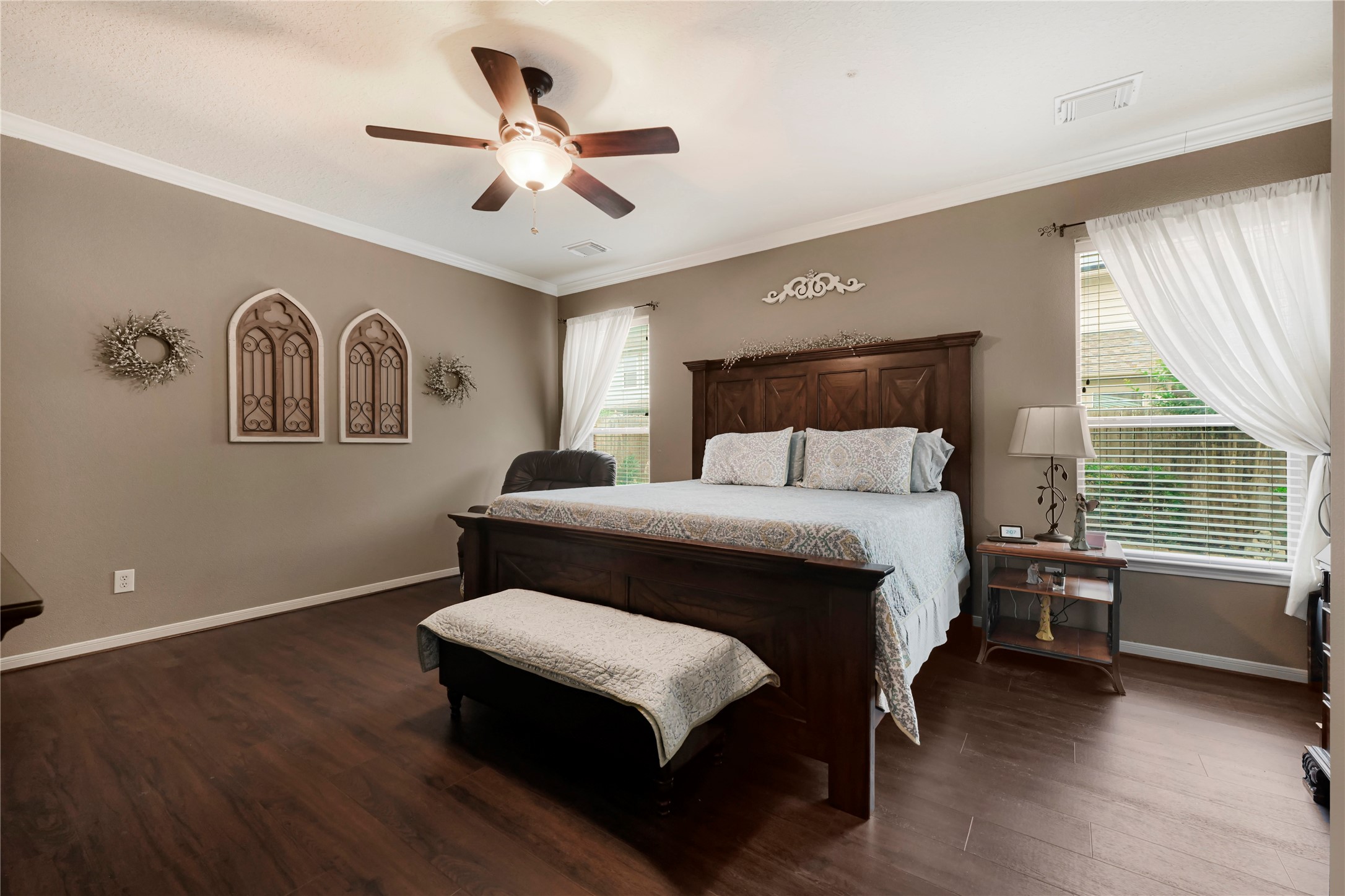15306 Progress Ridge Way Cypress, TX 77429 - Photo 16 of 37 a bedroom with a large bed and a window