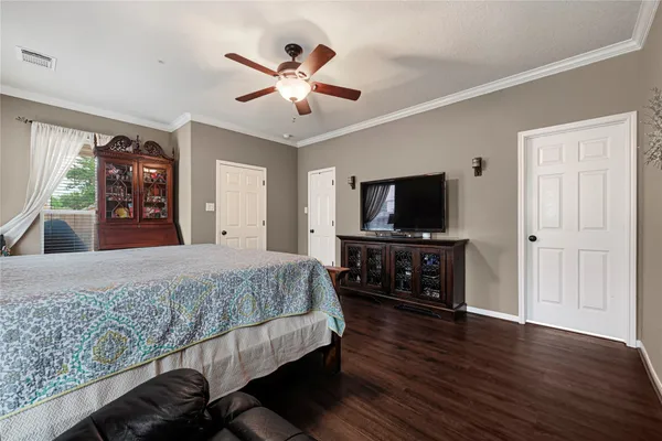a bathroom with a shower and a sink