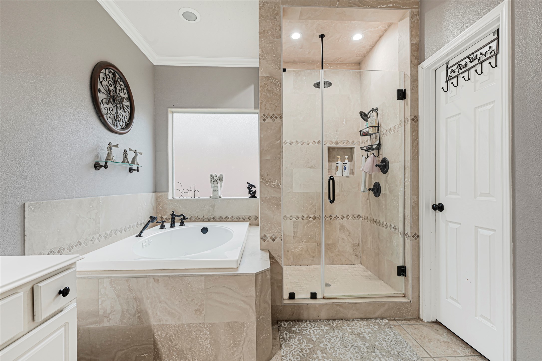 15306 Progress Ridge Way Cypress, TX 77429 - Photo 18 of 37 a bathroom with a shower and a sink