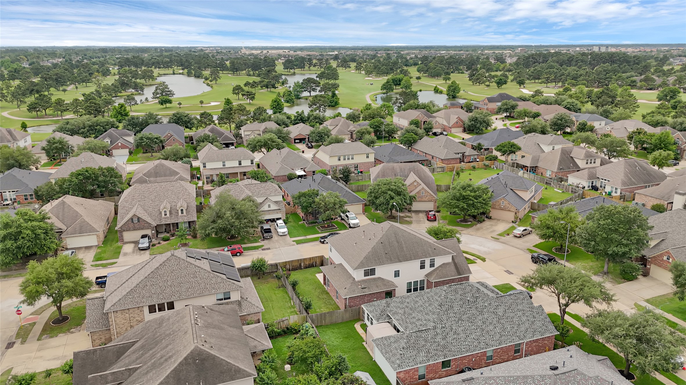 15306 Progress Ridge Way Cypress, TX 77429 - Photo 34 of 37 an aerial view of a house with a garden