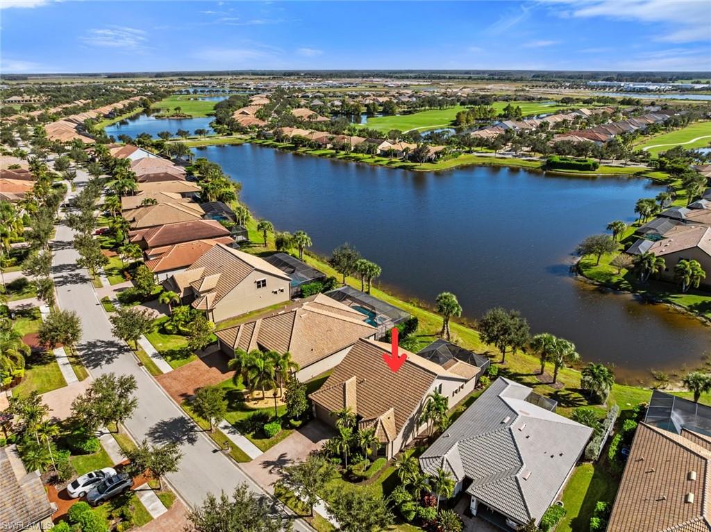 6264 Victory Drive Immokalee, FL 34142 - Photo 28 of 44 an aerial view of residential houses with outdoor space