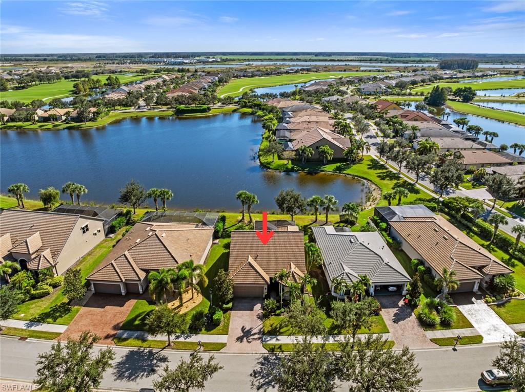 6264 Victory Drive Immokalee, FL 34142 - Photo 5 of 44 an aerial view of residential houses with outdoor space